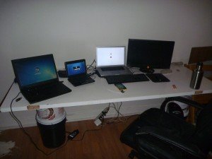 Mikey's bucket-and-door, work-from-home desk with linux, windows, and mac