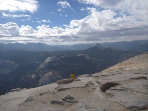 Mikey looking out at the vista from the top of half-dome