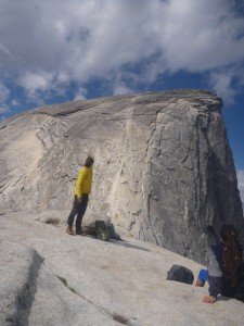 Mikey looks up towards the bottom of the cables to climb half-dome
