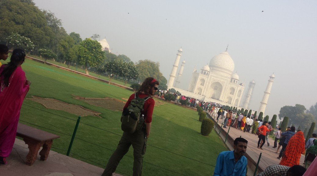 Mikey stands facing the Taj Mahal in Agra