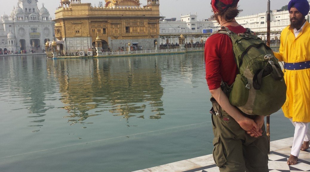 Mikey stands facing the Golden Temple in Amritsar