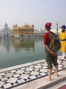 Mikey stands facing the Golden Temple in Amritsar