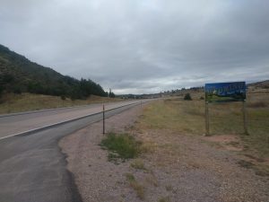 A sign reads "WELCOME TO WYOMING"