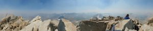 Mikey is sitting atop Matterhorn Peak. This panorama captures the whole view, which is smokey due to fires.
