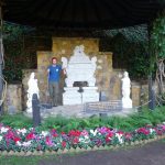 Mikey stands next to the sarcophagus holding Mahatma Gandhi's ashes in Los Angeles