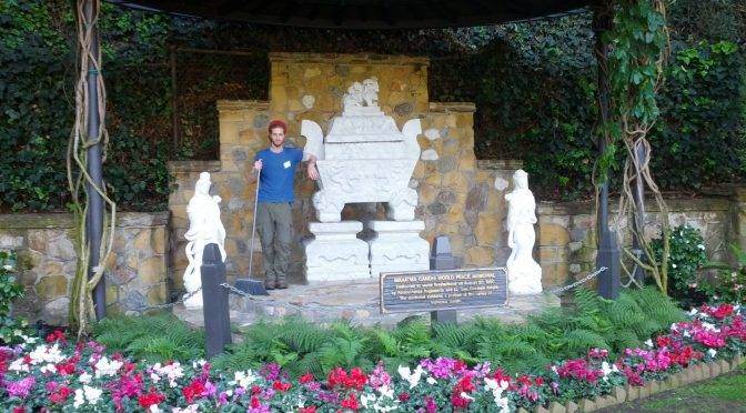 Mikey stands next to the sarcophagus holding Mahatma Gandhi's ashes in Los Angeles